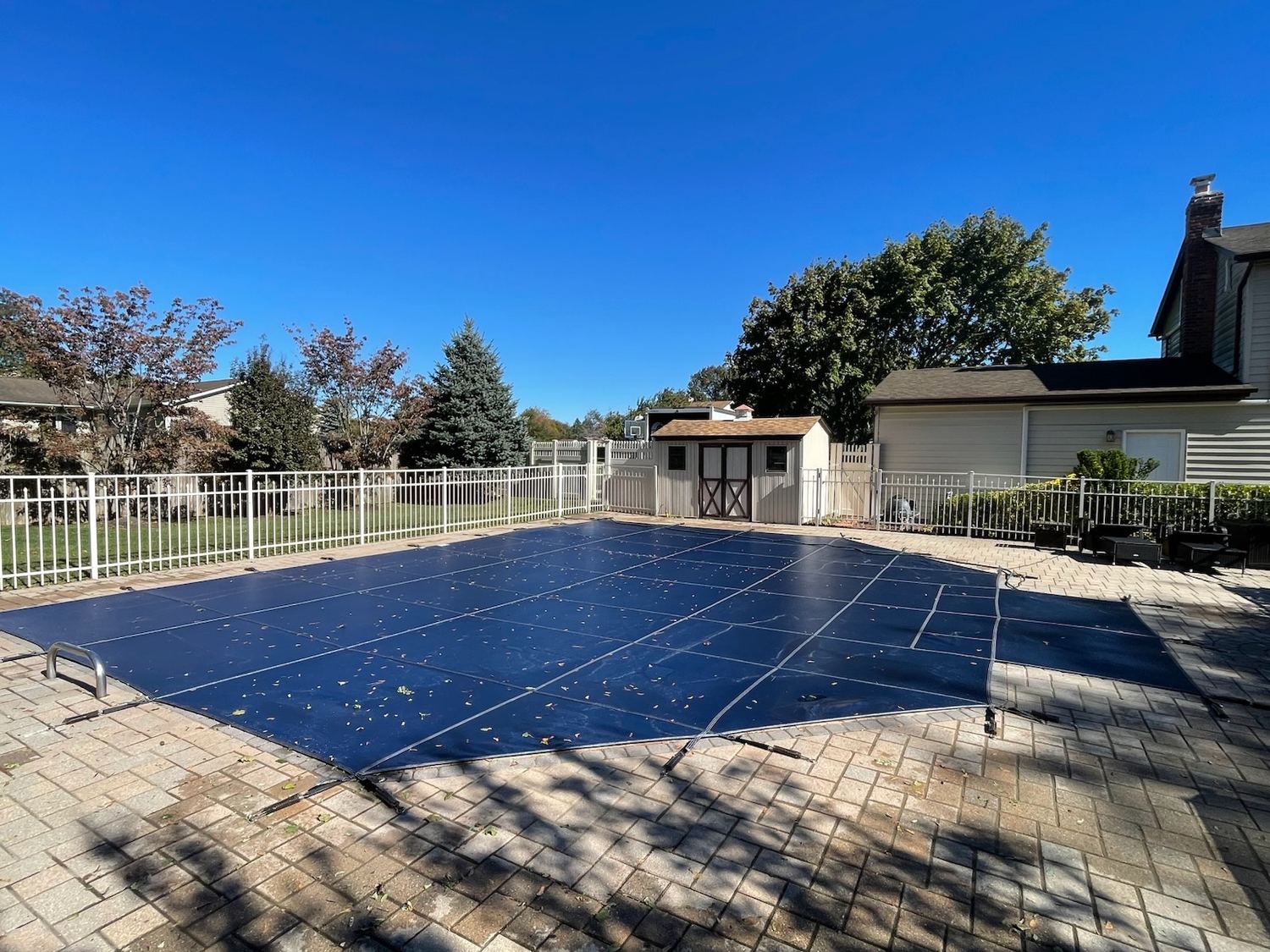 A pool fitted with a seasonal cover